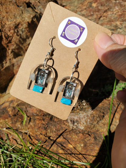 Earrings: High Priestess Tarot Card w/Turquoise and Aquamarine Crystals. Hand Made Resin Dangle Earrings. Silver Hardware. Window Shape.