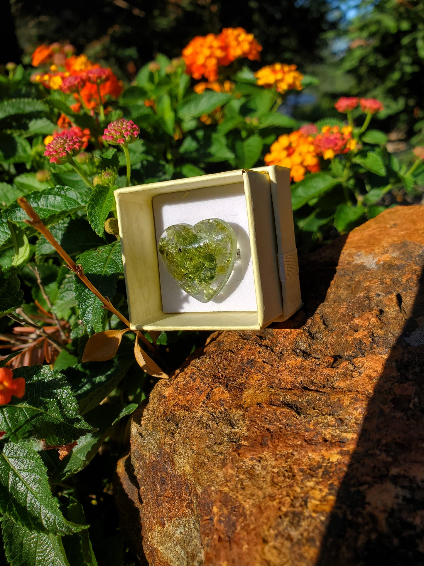 Chakra Ring Collection: FOR HELPING WITH THE ENERGY OF THE HEART CHAKRA. Heart Shape Resin with Green Peridot Crystals/Silver Hardware