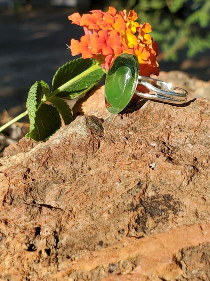 CHAKRA RING FOR HELPING WITH THE ENERGY OF THE HEART CHAKRA:  TEARDROP RESIN SHAPE SILVER HARDWARE W/JADE CRYSTALS