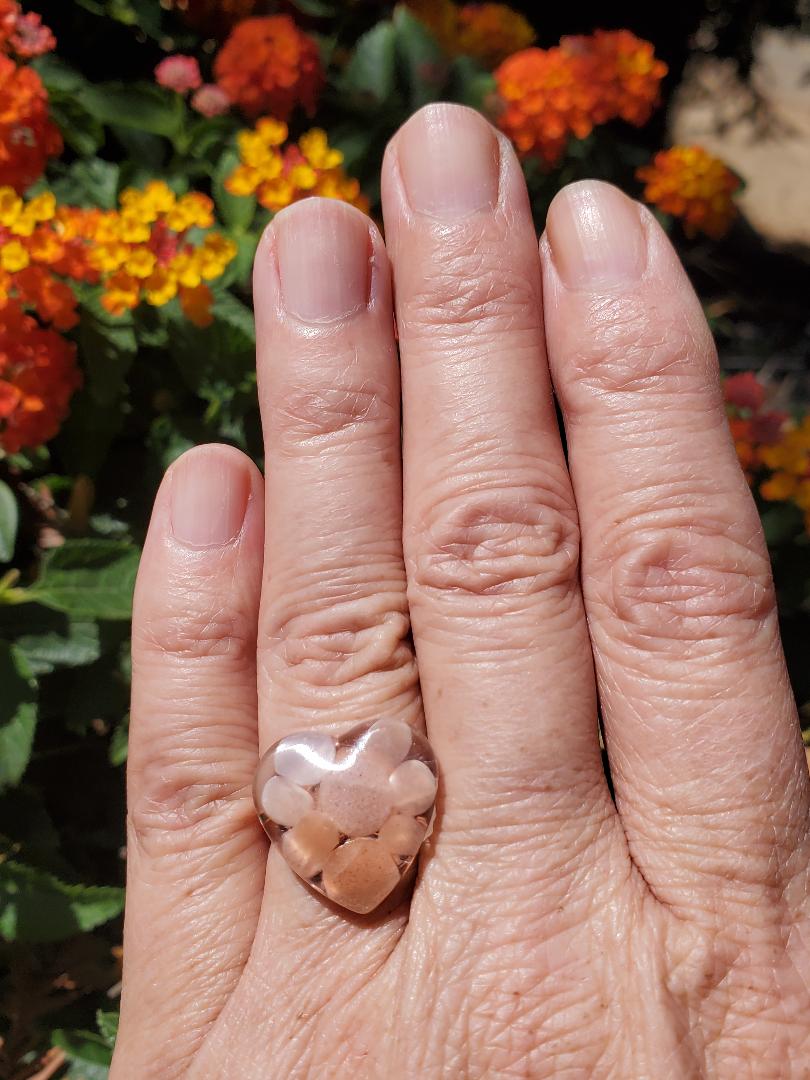 CHAKRA RING FOR HELPING WITH THE ENERGY OF THE HEART CHAKRA:  RESIN SHAPED HEART w/SAND STONE CYRSTALS/ROSE GOLD HARDWARE