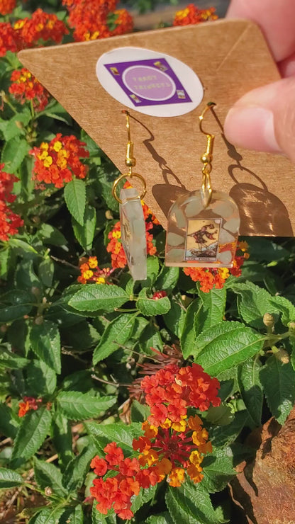 Earrings: FOOL TAROT CARD-OR THE DREAMER. RESIN WINDOW SHAPED EARRING W/GREEN AVENTURINE, GOLD HARDWARE.